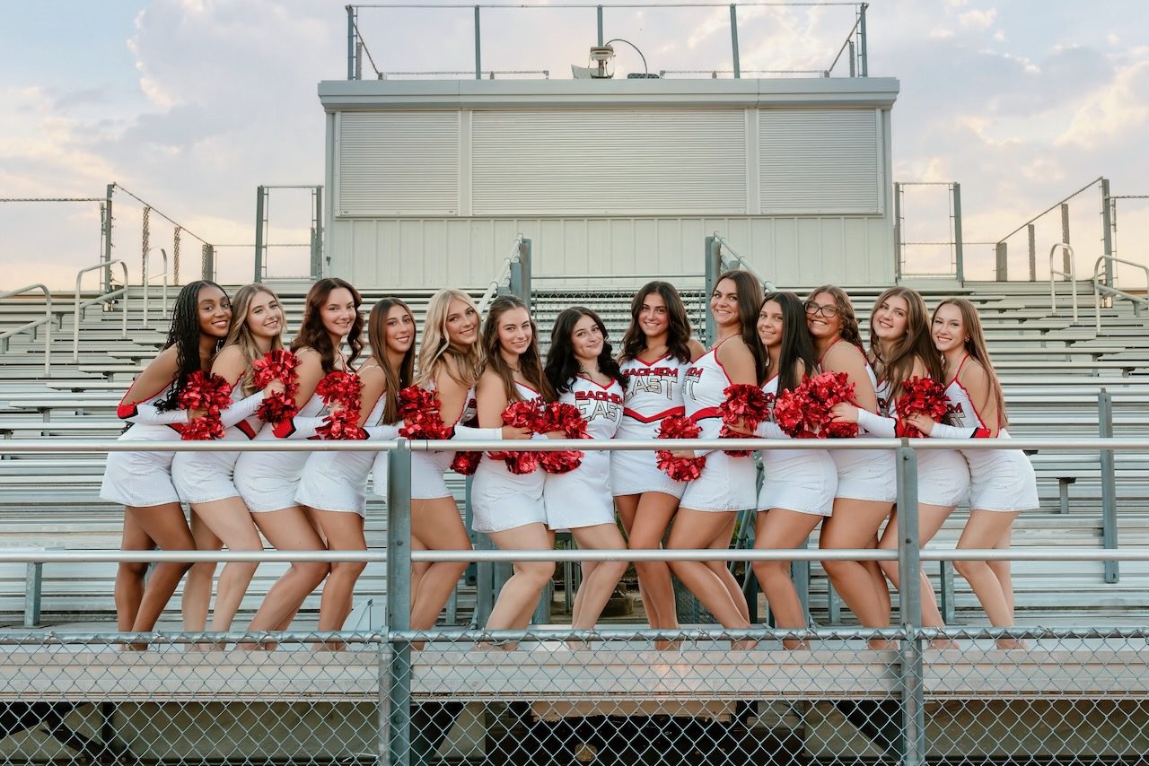 The Sachem East Varsity Arrowettes on the stadium bleachers
